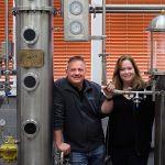 Afton, VA -  February 6:  Denver Riggleman and his wife Christine Riggleman stand by one of the stills at the Silverback Distillery they own in Afton, Va. Saturday, February 6, 2016.  They believe that the laws governing distilleries in Virginia are biased towards wineries and breweries which have a larger lobby and presence in the state.  (Photo by Norm Shafer/ For The Washington Post).