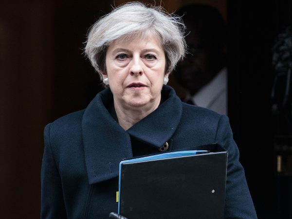 Prime Minister Theresa May leaves Downing Street on March 23, 2017 in London, England. The British Prime Minister Theresa May spoke last night after a terrorist attack took place in Westminster, saying Parliament would meet as normal today and "We will come together as normal".  PC Keith Palmer and three others lost their lives in the attack and the perpetrator was shot dead by police. *** Local Caption *** Theresa May