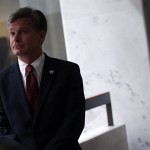 WASHINGTON, DC - JULY 13:  FBI Director nominee Christopher Wray waits in a hallway prior to his meeting with U.S. Sen. Mark Warner (D-VA) on Capitol Hill July 13, 2017 in Washington, DC. If confirmed, Wray will fill the position that has been left behind by former director James Comey who was fired by President Donald Trump about two months ago.  (Photo by Alex Wong/Getty Images)
