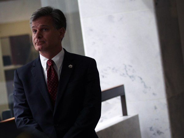 WASHINGTON, DC - JULY 13:  FBI Director nominee Christopher Wray waits in a hallway prior to his meeting with U.S. Sen. Mark Warner (D-VA) on Capitol Hill July 13, 2017 in Washington, DC. If confirmed, Wray will fill the position that has been left behind by former director James Comey who was fired by President Donald Trump about two months ago.  (Photo by Alex Wong/Getty Images)