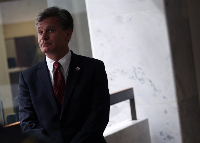 WASHINGTON, DC - JULY 13:  FBI Director nominee Christopher Wray waits in a hallway prior to his meeting with U.S. Sen. Mark Warner (D-VA) on Capitol Hill July 13, 2017 in Washington, DC. If confirmed, Wray will fill the position that has been left behind by former director James Comey who was fired by President Donald Trump about two months ago.  (Photo by Alex Wong/Getty Images)