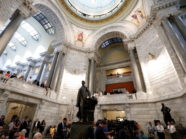 FRANKFORT, KY-AUGUST 30: African-American groups hold a rally at the Kentucky State Capitol building to urge Kentucky Governor Matt Bevin to remove a statue of Confederate President Jefferson Davis from the State Capitol rotunda August 30, 2017 in Frankfort Kentucky.  (Photo by Bill Pugliano/Getty Images)