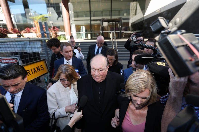 NOTE; THIS IS A COURT PICTURE. CHECK ID BEFORE USE - Archbishop Philip Wilson (old bald man, centre) - a Magistrate gives his judgement about whether or not he is guilty of concealing child sexual abuse. Newcastle Court, Newcastle.