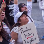 LOS ANGELES, CA - JUNE 30: People demonstrate and call out words of encouragement to immigrants held inside the Metropolitan Detention Center after marching to decry aggressive Trump administration immigration and refugee policies on June 30, 2018 in Los Angeles, California. Although President Trump was forced to reverse his policy of removing all children from their immigrant or asylum-seeking parents, little clarity appears to be seen as to how agencies can fulfill a court order to reunite thousands of children and parents detained far apart by multiple agencies. Yesterday, the Justice Department filed papers in a Los Angeles federal court to have families arrested for illegal border crossings incarcerated together indefinitely. The rally is one of more than 700 such protests being held throughout the nation.  (Photo by David McNew/Getty Images)