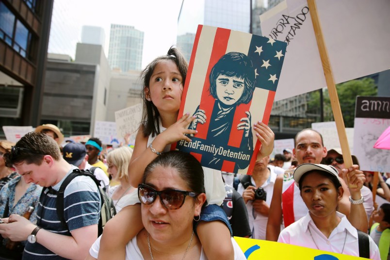 CHICAGO, June 30, 2018 -- People participate in the "Families Belong Together" rally at Daley Plaza in Chicago, the United States, on June 30, 2018. Tens of thousands of Americans marched and rallied across the United States to protest the Trump administration's "zero tolerance" immigration policy resulting in over 2,000 children separated from their families who crossed the border illegally. (Xinhua/Wang Ping)