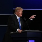 HEMPSTEAD, Sept. 27, 2016 -- Republican Donald Trump speaks during the first presidential debate with Democrat Hillary Clinton at Hofstra University in Hempstead of New York, the United States, Sept. 26, 2016. Donald Trump and Hillary Clinton on Monday held their first presidential debate in Hempstead. (Xinhua/Qin Lang)