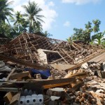 Houses damaged by earthquake are seen in North Lombok, Indonesia, Monday, Aug. 6, 2018. The powerful earthquake struck the Indonesian tourist island of Lombok, killing a number of people and shaking neighboring Bali, as authorities on Monday said thousands of houses were damaged and the death toll could climb. (AP Photo/Sidik Hutomo)