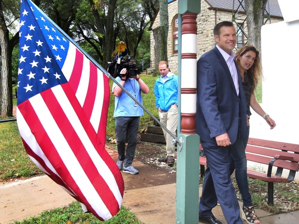 Kansas Secretary of State Kris Kobach and his wife Heather arrived to vote Tuesday morning, August 7th, 2018, at the Lecompton City Hall. Kobach is running for his party’s nomination for governor. (AP Photo, Topeka Capital-Journal, Thad Allton)