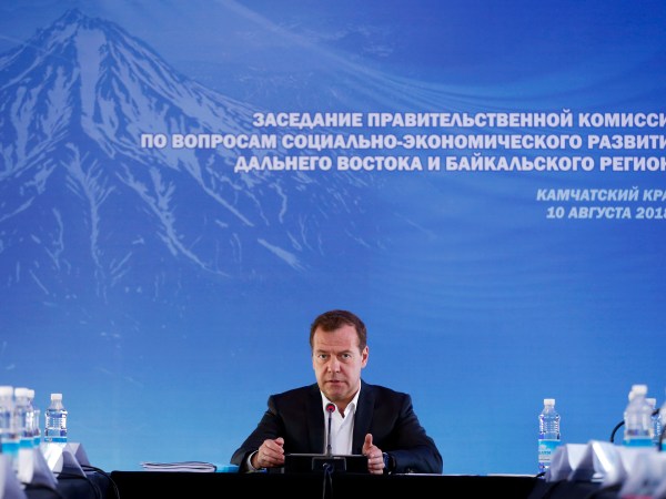 Russian Prime Minister Dmitry Medvedev speaks during a meeting in Kamchatka Peninsula region, Russian Far East, Russia, Friday, Aug. 10, 2018. Russia's prime minister sternly warned the United States on Friday against ramping up sanctions, saying that Moscow will retaliate with economic, political and unspecified "other" means. (Dmitry Astakhov, Sputnik, Government Pool Photo via AP)