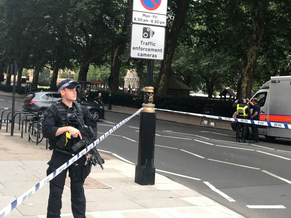 Police activity on Millbank, in central London, after a car crashed into security barriers outside the Houses of Parliament. PRESS ASSOCIATION Photo. Picture date: Tuesday August 14, 2018. See PA story POLICE Westminster. Photo credit should read: Sam Lister/PA Wire