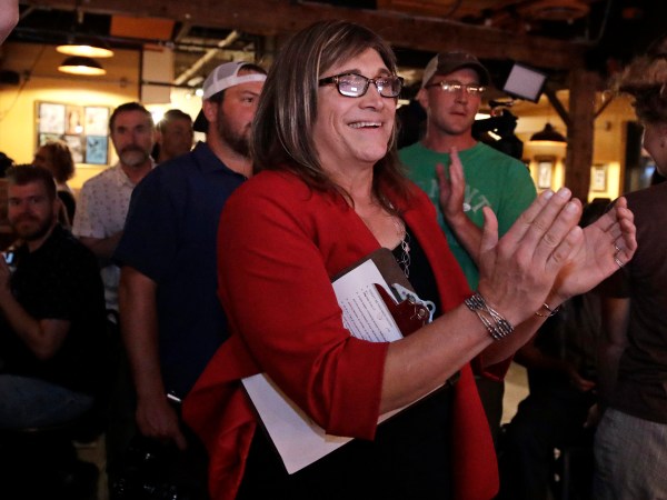 Vermont Democratic gubernatorial candidate Christine Hallquist, a transgender woman and former electric company executive, applauds with her supporters during her election night party in Burlington, Vt., Tuesday, Aug. 14, 2018. (AP Photo/Charles Krupa)
