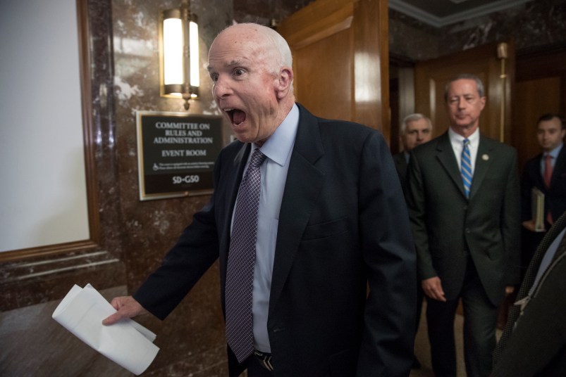 Senate Armed Services Chairman John McCain, R-Ariz., followed at right by House Armed Services Chairman Mac Thornberry, R-Texas, makes a humorous face to reporters as he arrives to speak before a meeting of the National Defense Authorization Act conferees, on Capitol Hill in Washington, Wednesday, Oct. 25, 2017.  (AP Photo/J. Scott Applewhite)