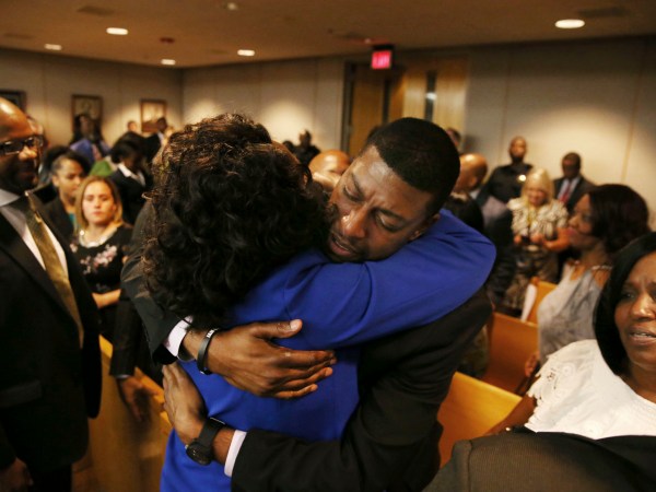 Odell Edwards, father of Jordan Edwards, gets a hug from Dallas County district attorney Faith Johnson after hearing a guilty of murder verdict during the ninth day of the trial of fired Balch Springs police officer Roy Oliver, who was charged with the murder of 15-year-old Jordan Edwards, at the Frank Crowley Courts Building in Dallas on Tuesday, Aug. 28, 2018. (Rose Baca - Pool/The Dallas Morning News) ORG XMIT: DMN1808281444083805