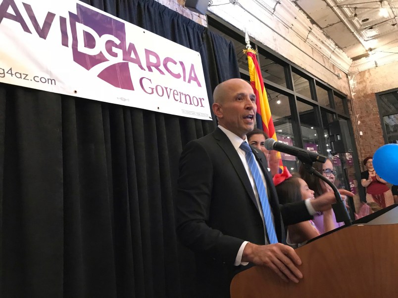 David Garcia, Democratic candidate for Arizona governor, speaks Tuesday, Aug. 28, 2018 at a victory celebration at a restaurant in Phoenix. Garcia, a Latino education professor, beat state Sen. Steve Farley and Kelly Fryer, former CEO of the YWCA Southern Arizona, to win the Democratic nomination for governor. (AP Photo/Anita Snow)