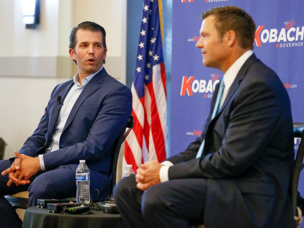 Donald Trump Jr., left, joins Kansas gubernatorial candidate Kris Kobach at a fundraising dinner at Noah's Event Venue in northeast Wichita, Kan. on Tuesday, July 17, 2018. (Fernando Salazar/Wichita Eagle/TNS)