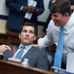 UNITED STATES - JULY 25: Reps. Scott Taylor, R-Va., left, and Steven Palazzo, R-Miss., House Appropriations Committee markup of the FY 2019 Homeland Security Appropriations Bill in Rayburn Building on July 25, 2018. (Photo By Tom Williams/CQ Roll Call)