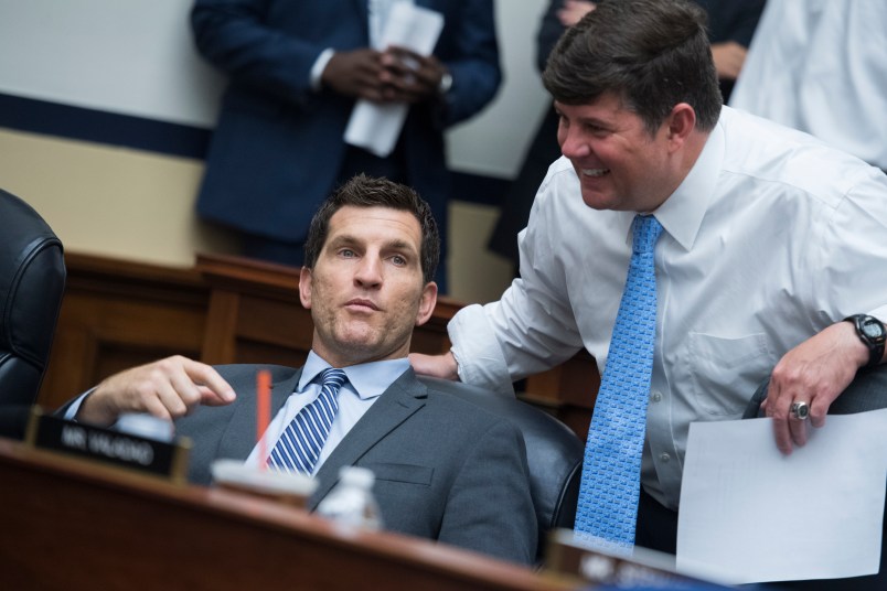 UNITED STATES - JULY 25: Reps. Scott Taylor, R-Va., left, and Steven Palazzo, R-Miss., House Appropriations Committee markup of the FY 2019 Homeland Security Appropriations Bill in Rayburn Building on July 25, 2018. (Photo By Tom Williams/CQ Roll Call)