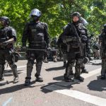 PORTLAND, OREGON, UNITED STATES - 2018/08/04: Police seen in downtown Portland during the Patriot Prayer Rally.The Proud Boys organized the Patriot Prayer Rally in Portland. The Proud Boys, a far right group supportive of President Donald Trump, used inflammatory language ahead of their rally, with some members promising violence. Counter-protesters led by Antifa confronted the participants of the Patriot Prayer Rally and clashed with police, leading to arrests and injuries. (Photo by Kainoa Little/SOPA Images/LightRocket via Getty Images)