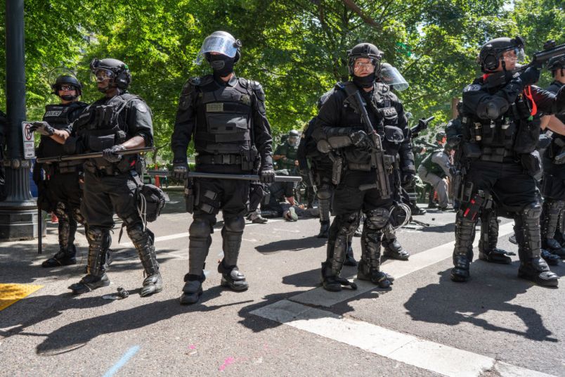 PORTLAND, OREGON, UNITED STATES - 2018/08/04: Police seen in downtown Portland during the Patriot Prayer Rally.The Proud Boys organized the Patriot Prayer Rally in Portland. The Proud Boys, a far right group supportive of President Donald Trump, used inflammatory language ahead of their rally, with some members promising violence. Counter-protesters led by Antifa confronted the participants of the Patriot Prayer Rally and clashed with police, leading to arrests and injuries. (Photo by Kainoa Little/SOPA Images/LightRocket via Getty Images)