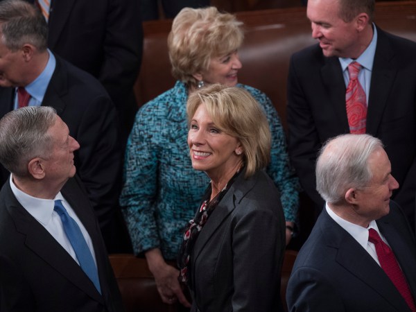 UNITED STATES - FEBRUARY 28: Secretary of Education Betsy DeVos,  is seen with other cabinet members in the House Chamber before President Donald Trump addressed a joint session of Congress in the Capitol, February 28, 2017. (Photo By Tom Williams/CQ Roll Call)
