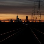 LYNDHURST, NJ - NOVEMBER 4: Train tracks lead to New York City as the sun rises behind lower Manhattan and One World Trade Center on November 4, 2017, as seen from Lyndhurst, New Jersey. (Photo by Gary Hershorn/Getty Images)