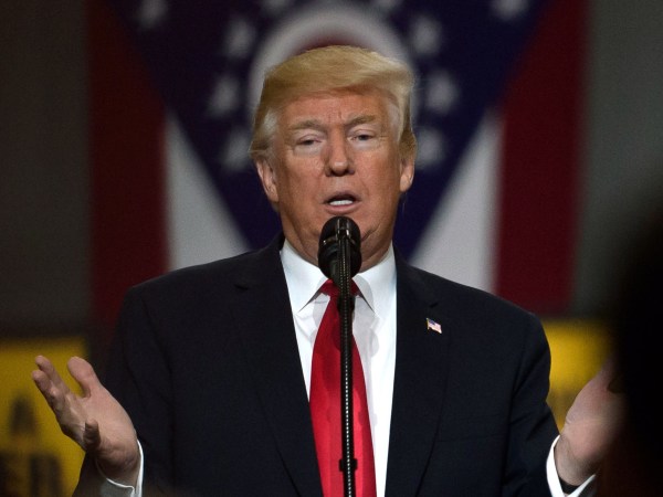 RICHFIELD, OHIO - MARCH 29:  U.S. President Donald Trump speaks to a crowd gathered at the Local 18 Richfield Facility of the Operating Engineers Apprentice and Training, a union and apprentice training center specializing in the repair and operation of heavy equipment on March 29, 2018 in Richfield, Ohio. President Trump's remarks centered upon infrastructure investment in the economy and labor statistics.  (Photo by Jeff Swensen/Getty Images)