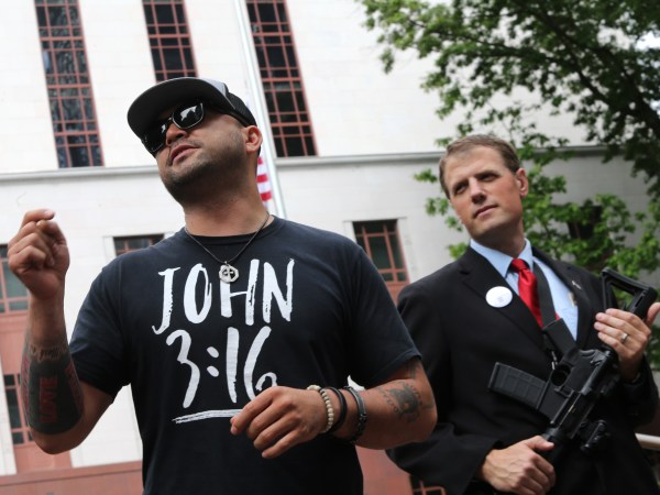 SEATTLE, WA - MAY 20: Joey Gibson (left), leader of the Patriot Prayer group, speaks during a rally advocating the right to openly carry guns in public, on May 20, 2018 in Seattle, Washington. Gibson is running for US Senate as a Republican. Mark Callahan (right), is running for a legislative position in Oregon (OR-5). (Photo by Karen Ducey/Getty Images)