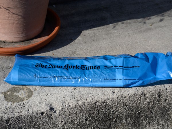 ALEXANDRIA, VA - APRIL 20, 2018:  A copy of a home-delivered New York Times sits on the front steps of a home in Alexandria, Virginia. (Photo by Robert Alexander/Getty Images)