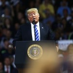 CHARLESTON, WV - AUGUST 21:  People cheer as President Donald Trump speaks at a rally on August 21, 2018 in Charleston, West Virginia. Paul Manafort, a former campaign manager for Donald Trump and a longtime political operative, was found guilty of eight financial crimes Tuesday in a Washington court. In further developments for the president, his former lawyer, Michael Cohen, has plead guilty in New York as part of a separate deal withÊprosecutors.  (Photo by Spencer Platt/Getty Images) *** Local Caption *** Donald Trump