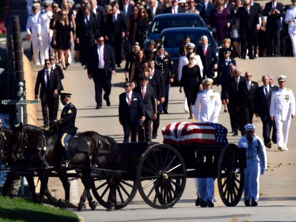The casket of Sen. John McCain, R-Ariz., is brought to Annapolis, Md., Sunday, Sept. 2, 2018, for his funeral service and burial. McCain died Aug. 25 from brain cancer at age 81. (AP Photo/Susan Walsh)