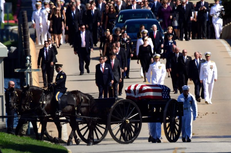 The casket of Sen. John McCain, R-Ariz., is brought to Annapolis, Md., Sunday, Sept. 2, 2018, for his funeral service and burial. McCain died Aug. 25 from brain cancer at age 81. (AP Photo/Susan Walsh)