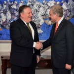 In this photo released by Press Information Department, visiting U.S. Secretary of State Mike Pompeo, left, shakes hand with Pakistan's foreign minister Shah Mahmood Qureshi, prior to their meeting in Islamabad, Pakistan, Wednesday, Sept. 5, 2018. Pompeo arrived in Pakistan on Wednesday at a time when relations between the two countries have sunk to a new low. (Press Information Department via AP)