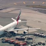 In this image made from video provided by WABC 7, emergency response crews gather outside a plane at JFK Airport after several passengers became sick on an Emirates flight from Dubai Wednesday, Sept. 5, 2018, in New York. (WABC 7 via AP)