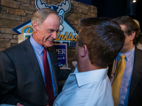 Incumbent U.S. Sen. Tom Carper shakes hands from his supportert as he beats progressive political newcomer Kerri Evelyn Harris.