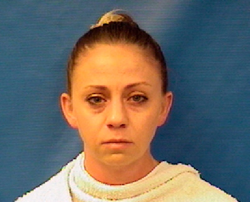 This handout photo provided by the Kaufman County Sheriff's Office shows Amber Renee Guyger. Guyger, a Dallas police officer was arrested Sunday on a manslaughter warrant in the shooting of a black man at his home, Texas authorities said. The Texas Department of Public Safety said in a news release that Officer Guyger was booked into the Kaufman County Jail and that the investigation is ongoing. It said no additional information is available at this time. (Kaufman County Sheriff's Office via AP)