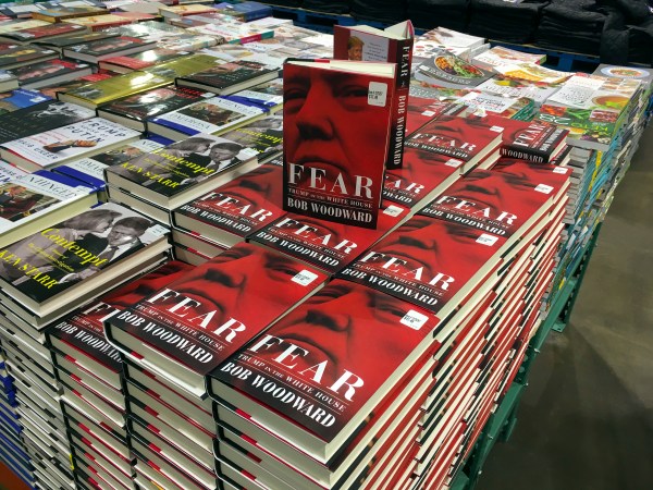 Copies of Bob Woodward's "Fear" are seen for sale at Costco, Wednesday, Sept. 11, 2018 in Arlington, Va. It's not clear whether President Donald Trump has much to fear from "Fear" itself. But the book of that name has set off a yes-no war between author Bob Woodward and the president, using all the assets they can muster. (AP Photo/Pablo Martinez Monsivais)