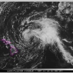 This satellite image from the National Oceanic and Atmospheric Administration (NOAA) shows Tropical Storm Olivia east of the main islands of Hawaii at around 10 a.m. Hawaii time Tuesday, Sept. 11, 2018. Olivia is dropping light rain on Maui and the Big Island as its outer rain bands approach the state. Central Pacific Hurricane Center meteorologist Matthew Foster says the storm could deposit 10 to 15 inches of rain on the islands, though some areas could get as much as 20 inches. Foster says it appears Maui County, the group of four islands just north of the Big Island, or Oahu will experience the worst effects. (NOAA via AP)