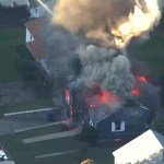 In this image take from video provided by WCVB in Boston, firefighters battle a raging house fire in Lawrence, Mass, a suburb of Boston, Thursday, Sept. 13, 2018. Emergency crews are responding to what they believe is a series of gas explosions that have damaged homes across three communities north of Boston. (WCVB via AP)