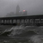 Strong wind caused by Typhoon Mangkhut  is seen on the waterfront of Victoria Habour Hong Kong, Sunday, Sept. 16, 2018. Hong Kong and southern China hunkered down as strong winds and heavy rain from Typhoon Mangkhut lash the densely populated coast. The biggest storm of the year left at least 28 dead from landslides and drownings as it sliced through the northern Philippines. (AP Photo/Vincent Yu)