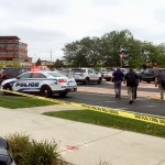 Emergency personnel arrive a the scene where a shooting was reported at a software company in Middleton, Wis., a suburb of Madison, Wednesday, Sept. 19, 2018. Multiple people were reported to have been shot. (AP Photo/Todd Richmond)
