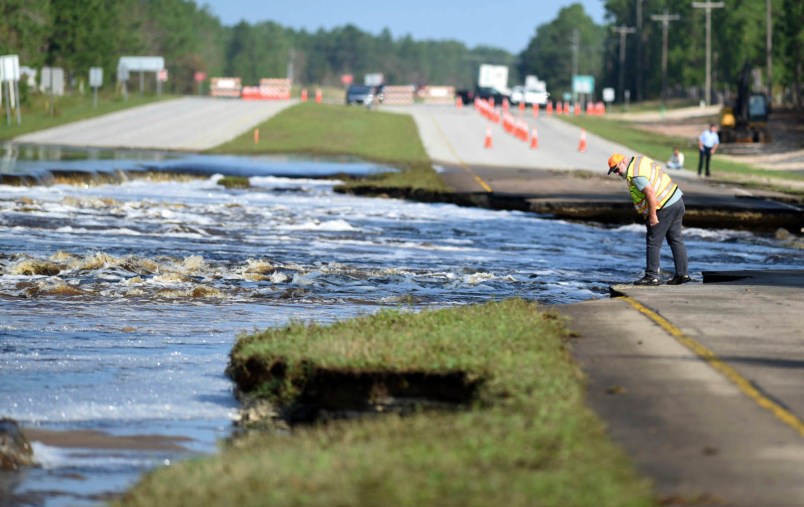 Flooding from Sutton Lake has washed away part of U.S. 421 in New Hanover County just south of the Pender County line in Wilmington, N.C., Friday, September 21, 2018.  [Matt Born/StarNews Photo]