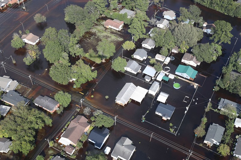 LUMBERTON, NC - SEPTEMBER 20:  Flood waters are seen surrounding homes after heavy rains from Hurricane Florence on September 20, 2018 in Lumberton, North Carolina. Residents have begun cleaning up in North Carolina as the flooding has begun to subside.  (Photo by Joe Raedle/Getty Images)