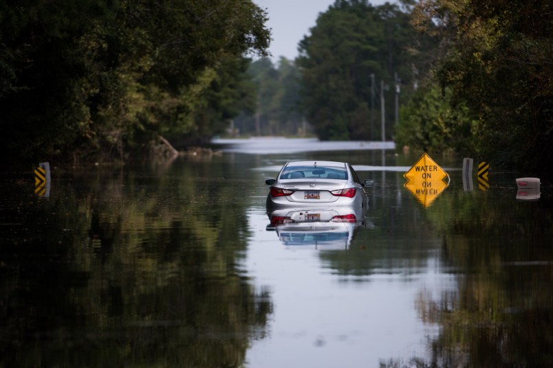LONGS, SC - SEPTEMBER 21: A disabled car is surrounded by floodwaters caused by Hurricane Florence near the Todd Swamp on September 21, 2018 in Longs, South Carolina. Floodwaters are expected to rise in the area in through the weekend. (Photo by Sean Rayford/Getty Images)