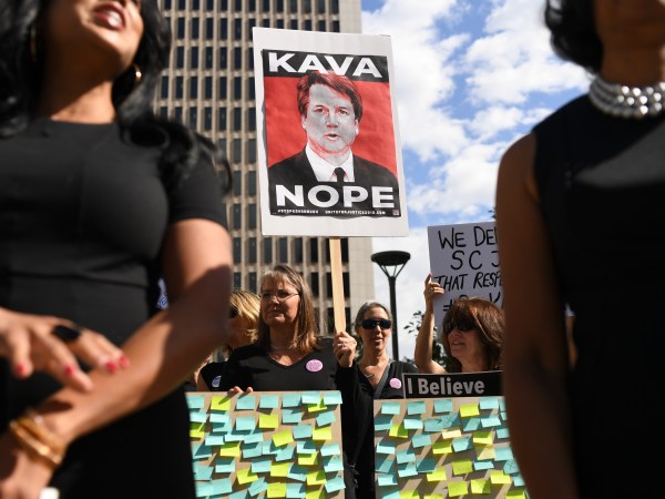 DENVER, CO - SEPTEMBER 24: Survivors of sexual assault and members of local rights groups rally near Senator Cory Gardner’s Denver office on September 24, 2018 in Denver, Colorado. The rally was in support Dr. Christine Blasey Ford and Deborah Ramirez, and asked Senator Gardner to call for Brett Kavanaugh to withdraw his nomination for the Supreme Court. (Photo by RJ Sangosti/The Denver Post)