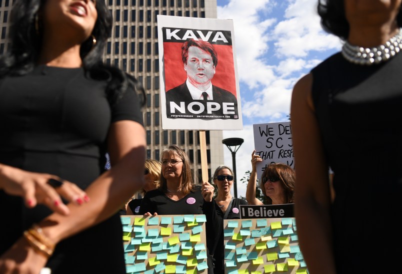 DENVER, CO - SEPTEMBER 24: Survivors of sexual assault and members of local rights groups rally near Senator Cory Gardner’s Denver office on September 24, 2018 in Denver, Colorado. The rally was in support Dr. Christine Blasey Ford and Deborah Ramirez, and asked Senator Gardner to call for Brett Kavanaugh to withdraw his nomination for the Supreme Court. (Photo by RJ Sangosti/The Denver Post)
