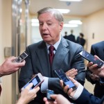 UNITED STATES - SEPTEMBER 25: Sen. Lindsey Graham, R-S.C., talks with reporters in the basement of the Capitol before the Senate policy luncheons on September 25, 2018. (Photo By Tom Williams/CQ Roll Call)