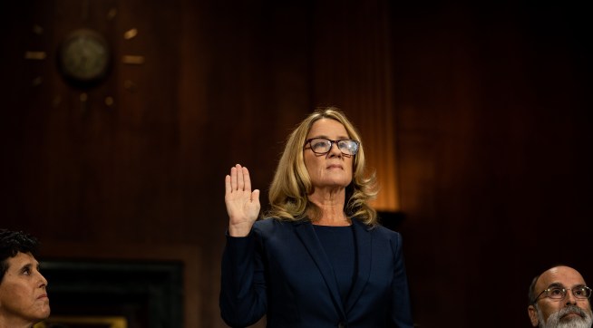 WASHINGTON, DC - SEPTEMBER 27:  Christine Blasey Ford is sworn in prior to giving testimony before the U.S. Senate Judiciary Committee at the Dirksen Senate Office Building on Capitol Hill September 27, 2018 in Washington, DC. Blasey Ford, a professor at Palo Alto University and a research psychologist at the Stanford University School of Medicine, has accused Supreme Court nominee Brett Kavanaugh of sexually assaulting her during a party in 1982 when they were high school students in suburban Maryland.