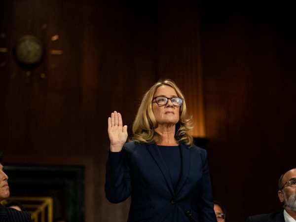 WASHINGTON, DC - SEPTEMBER 27:  Christine Blasey Ford is sworn in prior to giving testimony before the U.S. Senate Judiciary Committee at the Dirksen Senate Office Building on Capitol Hill September 27, 2018 in Washington, DC. Blasey Ford, a professor at Palo Alto University and a research psychologist at the Stanford University School of Medicine, has accused Supreme Court nominee Brett Kavanaugh of sexually assaulting her during a party in 1982 when they were high school students in suburban Maryland.