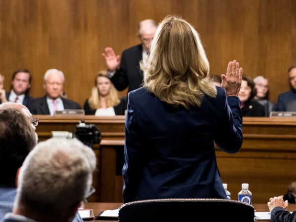WASHINGTON, DC - SEPTEMBER 27: Dr. Christine Blasey Ford is sworn in by chairman Chuck Grassley, R-Iowa, on Capitol Hill September 27, 2018 in Washington, DC. A professor at Palo Alto University and a research psychologist at the Stanford University School of Medicine, Ford has accused Supreme Court nominee Judge Brett Kavanaugh of sexually assaulting her during a party in 1982 when they were high school students in suburban Maryland. (Photo By Tom Williams-Pool/Getty Images)