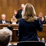 WASHINGTON, DC - SEPTEMBER 27: Dr. Christine Blasey Ford is sworn in by chairman Chuck Grassley, R-Iowa, on Capitol Hill September 27, 2018 in Washington, DC. A professor at Palo Alto University and a research psychologist at the Stanford University School of Medicine, Ford has accused Supreme Court nominee Judge Brett Kavanaugh of sexually assaulting her during a party in 1982 when they were high school students in suburban Maryland. (Photo By Tom Williams-Pool/Getty Images)
